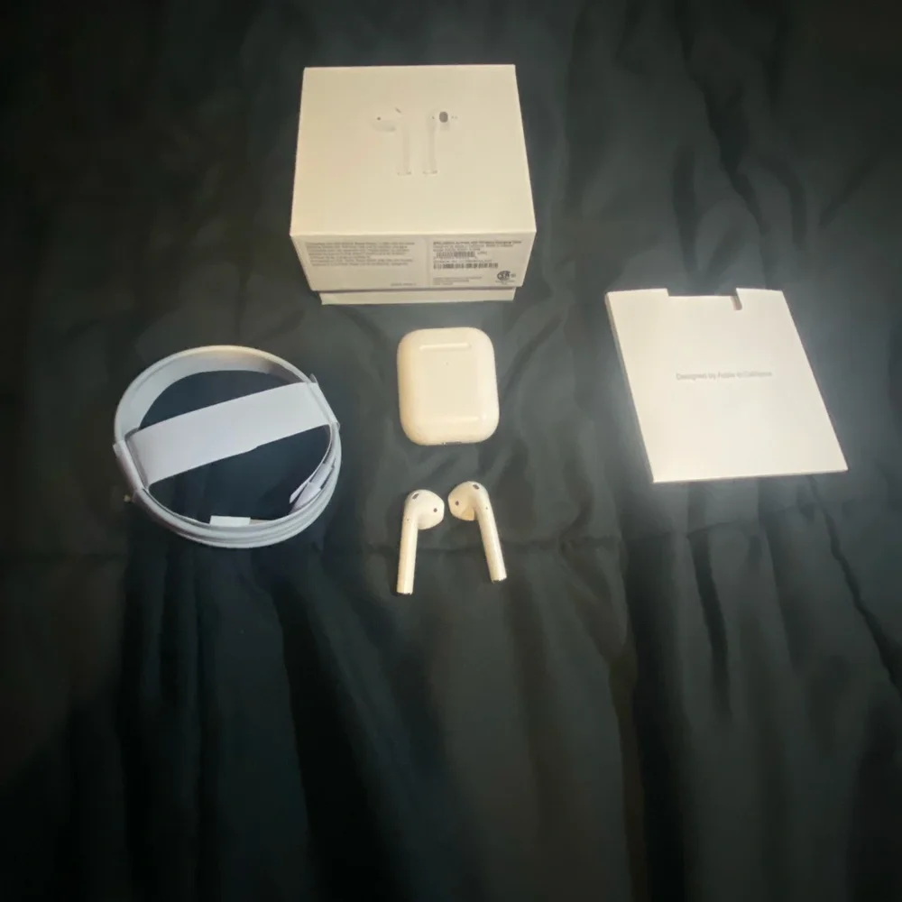 Apple White Earbuds with Compact Charging Case